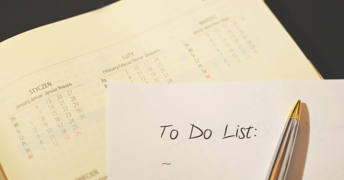 Close-up of a calendar and to-do list on a desk, emphasizing planning and organization.