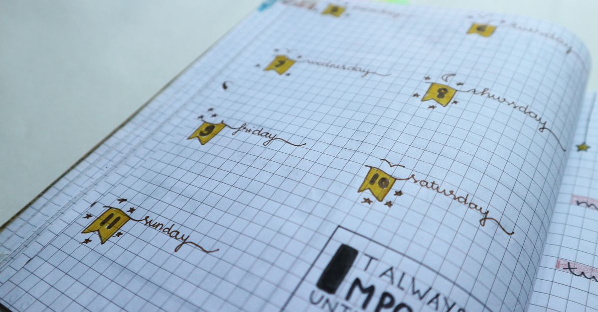 Colorful bullet journal showcasing a weekly planner with creative designs and motivational quote.